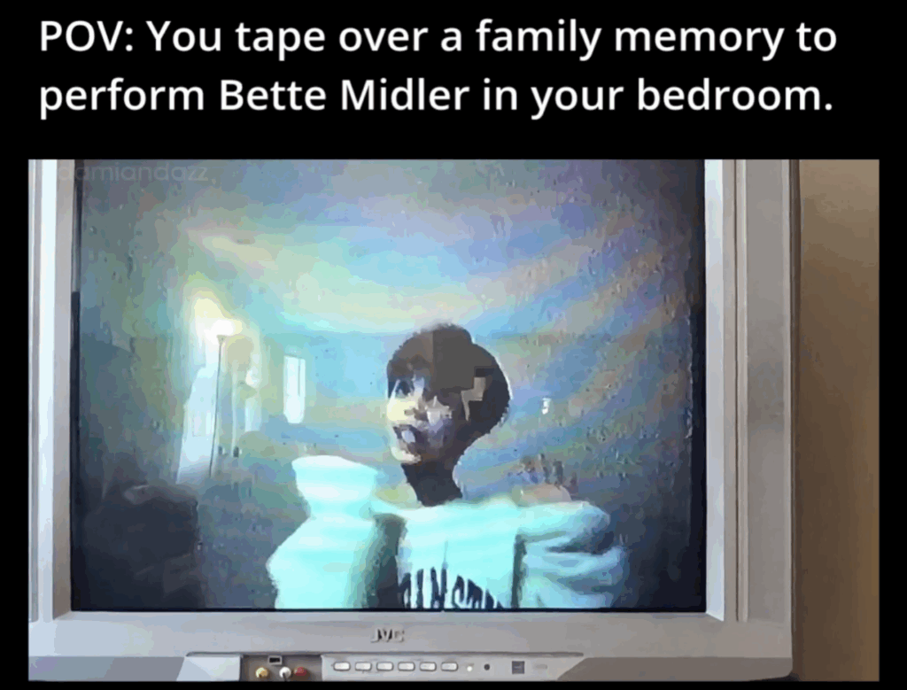 Childhood video still of a young boy performing Bette Midler in his bedroom, later referenced in a family story about watching Beaches
